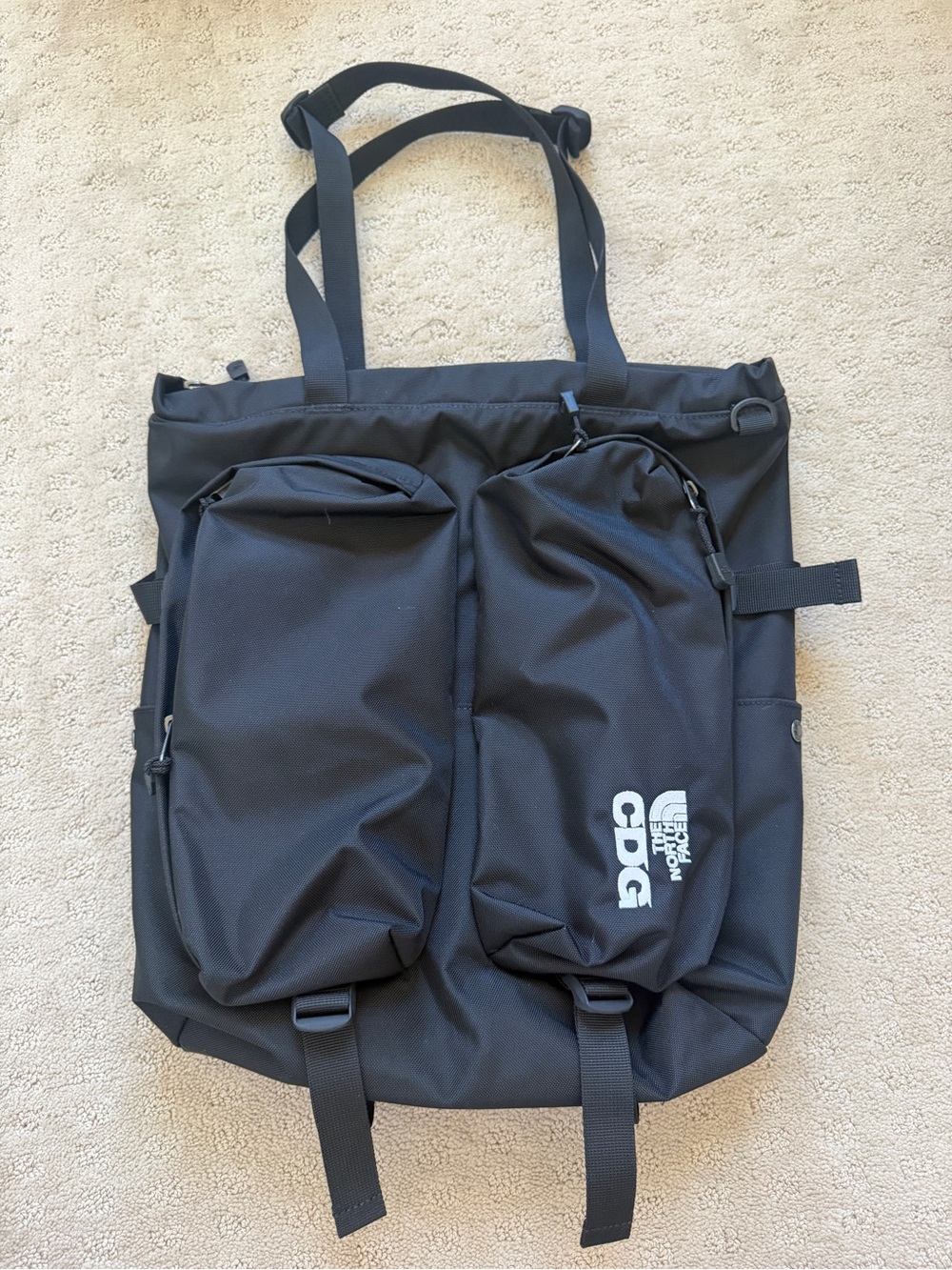 The North Face x CDG collab Black Tote with Dual Front Pouches